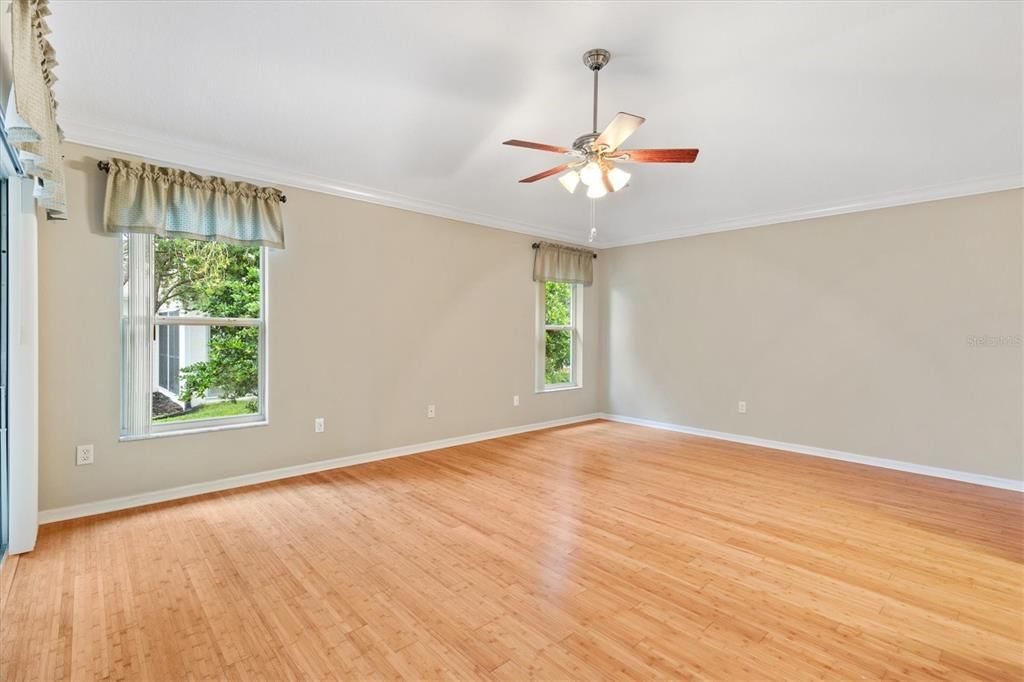 Primary bedroom with sliders leading to the lanai.