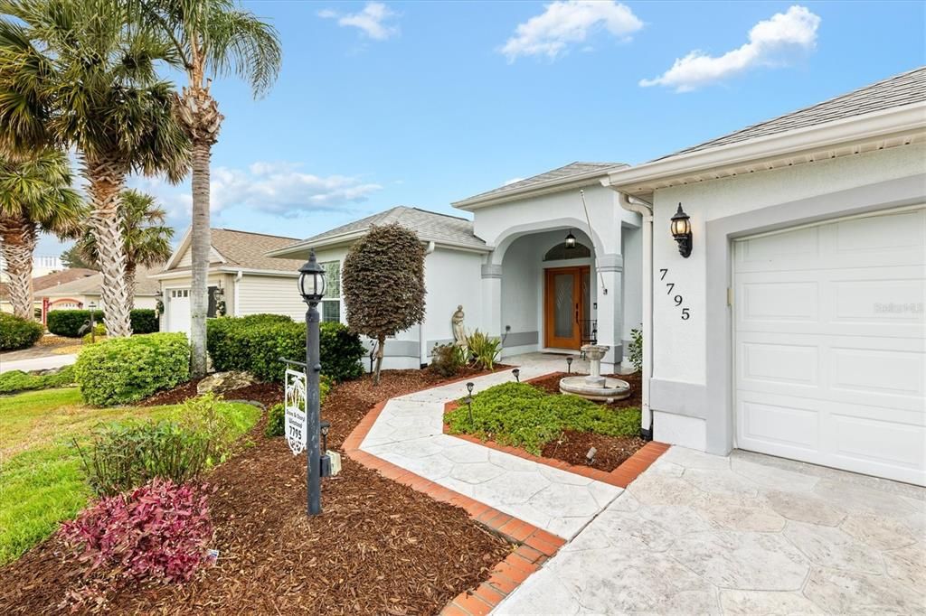 Front yard with fountain.