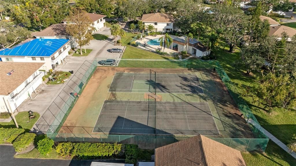 Tennis Courts and Pool Beyond Them