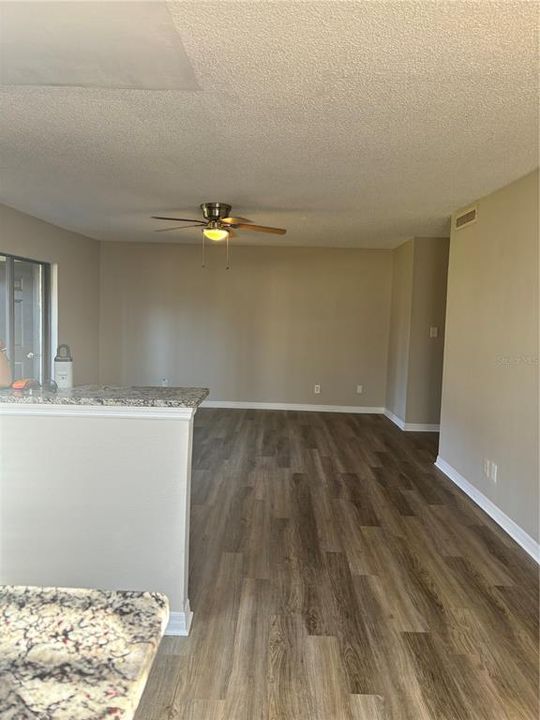 View of new floors in living area.