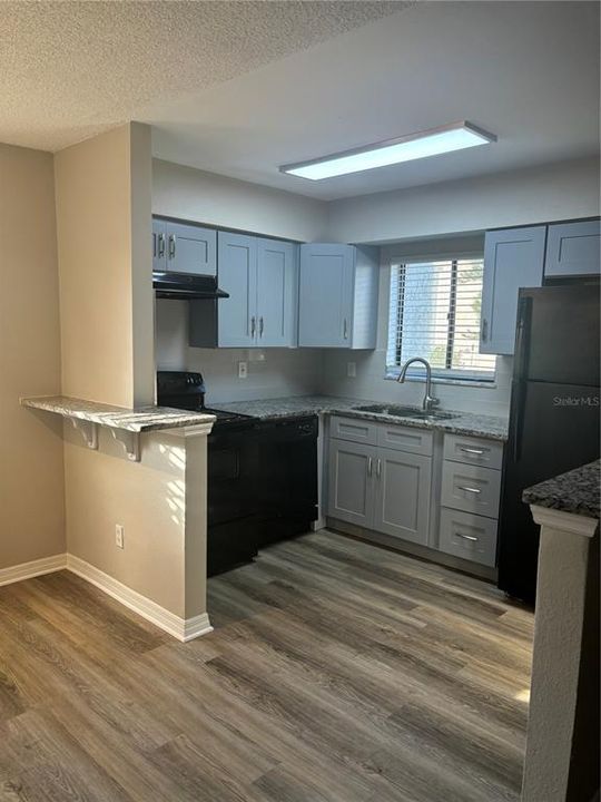 View of dining nook and kitchen