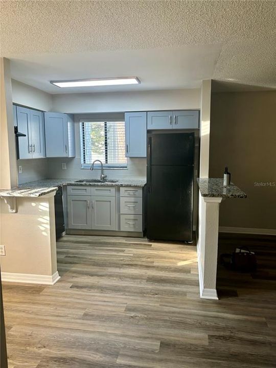 Granite counters and breakfast bar