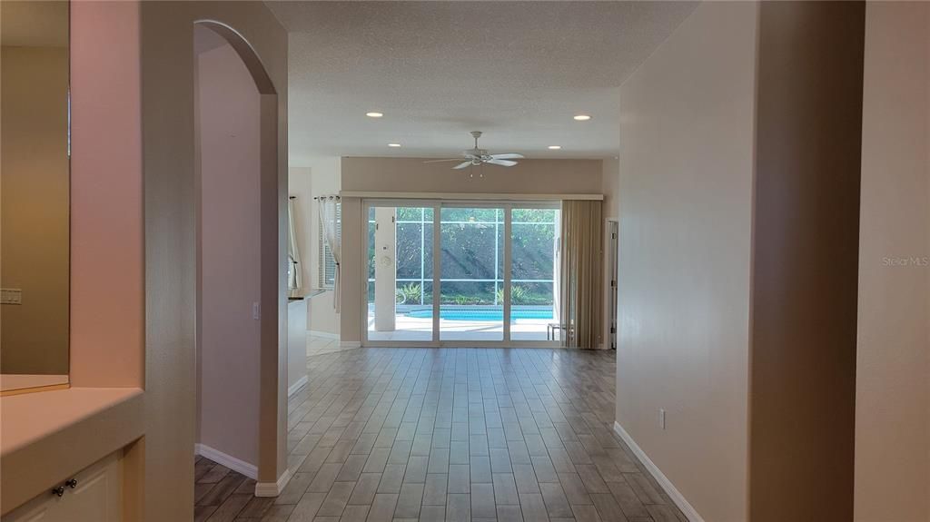 Standing in front door looking into the house