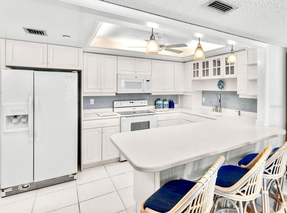 Primary Bathroom boasts walk in tub AND walk in shower in a separate space.