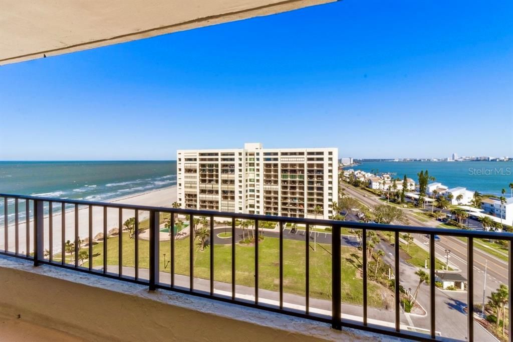 Living / dining area with Gulf Beach views AND in the evenings sparkling city views to the East over the Intracoastal Waterway