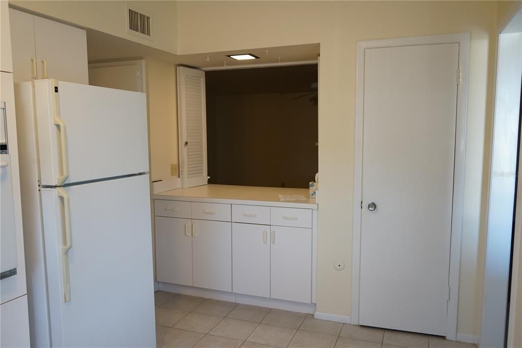 closet pantry, extra cabinets and pass thru to living and dining area