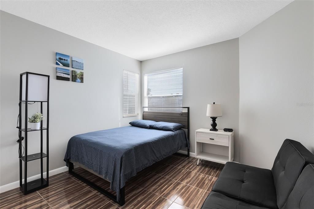 The second bedroom offers flexibility for guests, a home office, or whatever suits your needs, with a full bathroom conveniently across the hall.