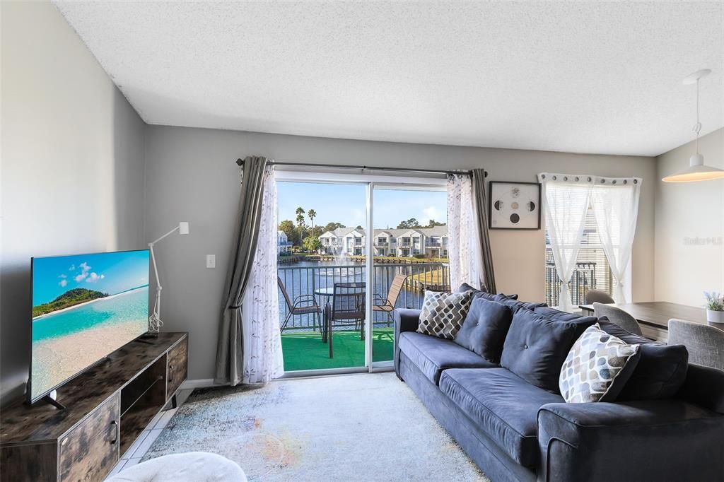 Spacious living room with gorgeous views of the water.