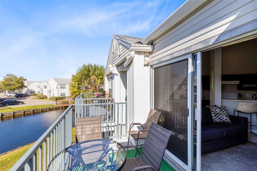 coffee to the sound of the fountain or unwinding with a cocktail at sunset. Plus, there's a storage closet on the balcony for added convenience.