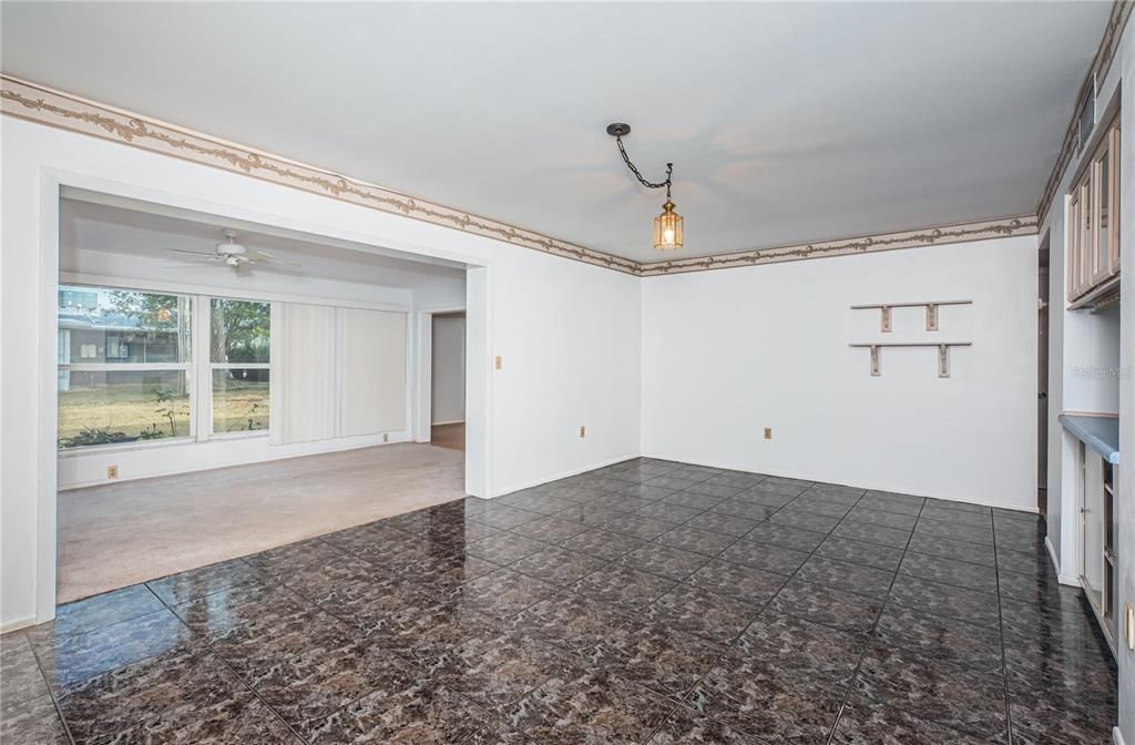 Great dining/living room area with pass through from the kitchen and leading to the family room