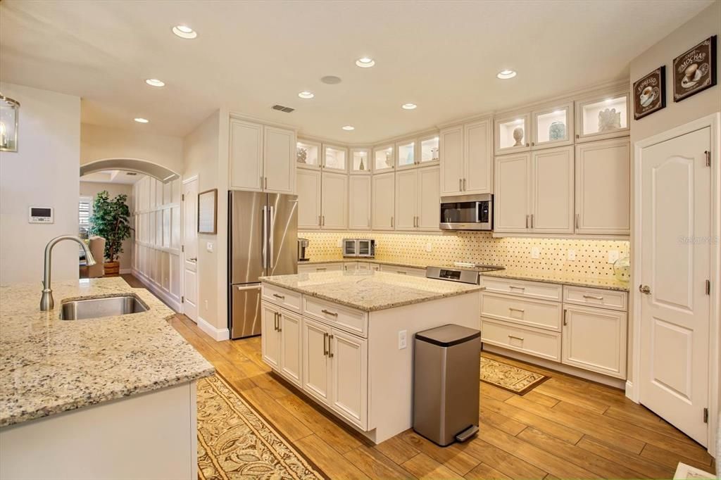 Custom kitchen w/ center island, storage on both sides