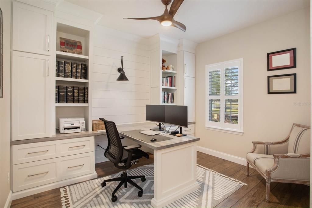 Office w/ Built-in shelving and desk