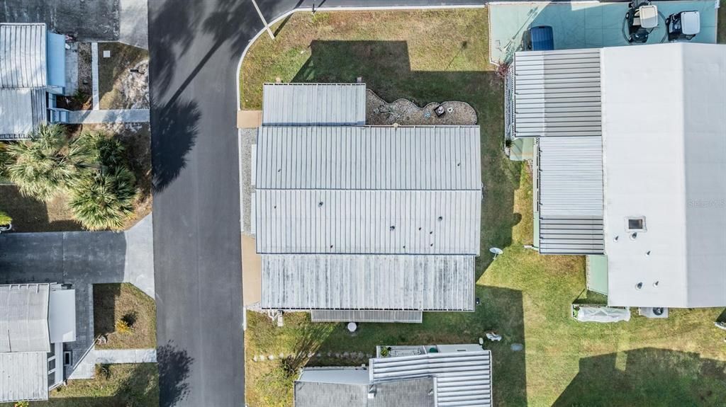 Metal roof over on this home.