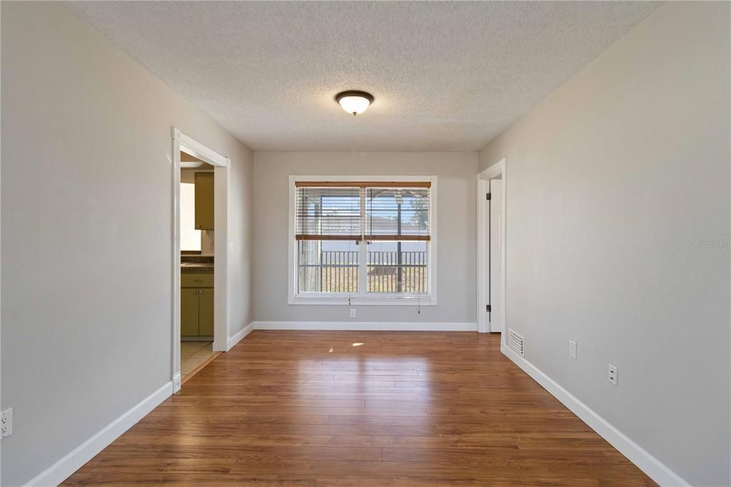 Living Room Facing Backyard And Kitchen Left