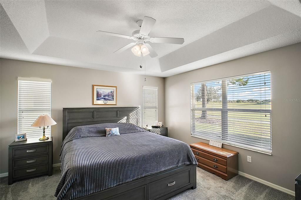 Large Primary bedroom with golf course view