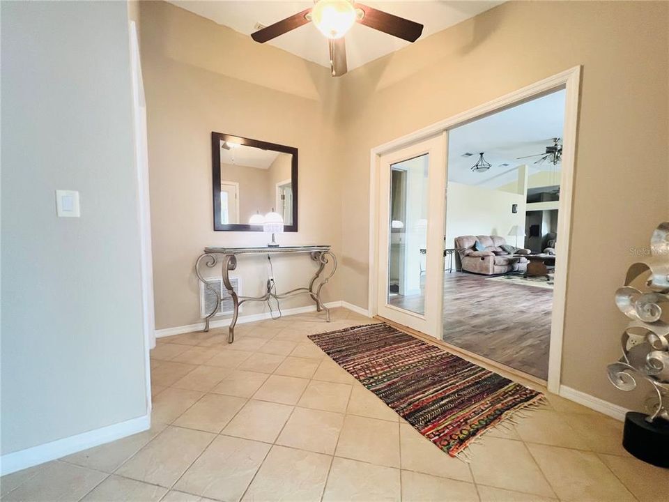 ENTRANCE TO IN LAW SUITE, RENTAL, MASTER BEDROOM 2 LOCATED ABOVE GARAGE OPPOSITE SIDE OF POOL AND OTHER LARGE ROOM