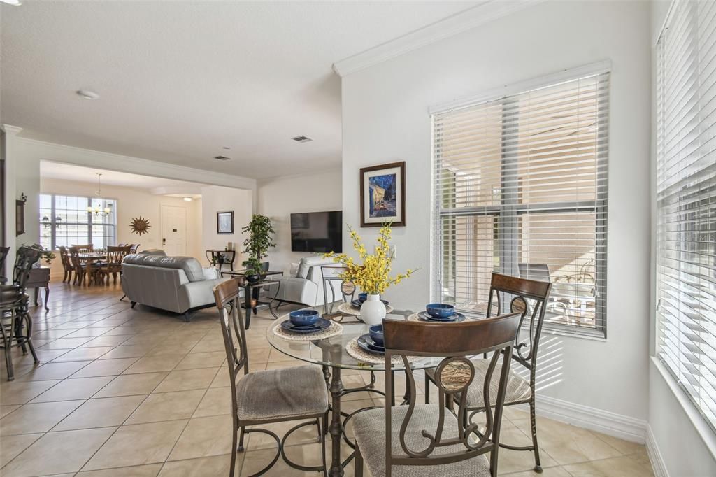 View of breakfast nook, great room, and dining room.