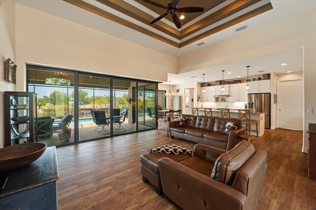 Living Room with disappearing zero edge sliding glass doors