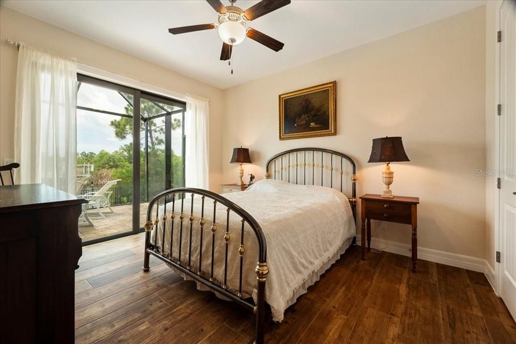 Bedroom #2 with private access to lanai & pool