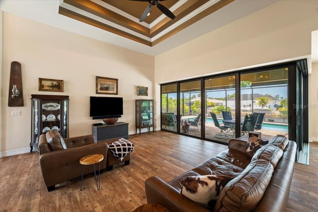 Living Room accented with double tray ceiling