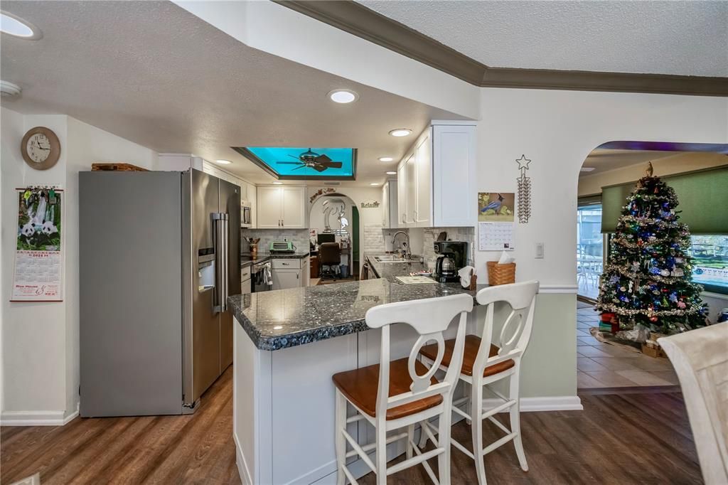 breakfast bar and stainless appliances