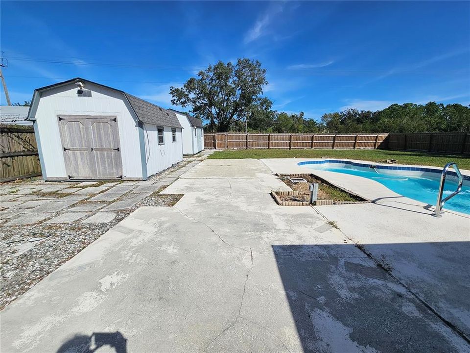 HUGE yard with 2 outdoor sheds