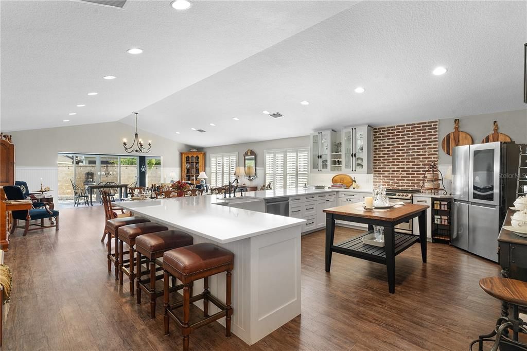 AN AMAZING TRANSFORMATION OF THE ORIGINAL KITCHEN WITH MUCH MORE SPACE WITH SPARKLING WHITE QUARTZ COUNTERSTOPS.