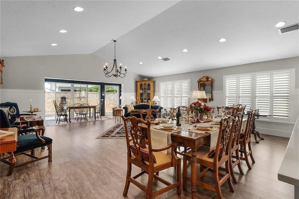 VAULTED CEILINGS AND PLANTATION SHUTTERS.