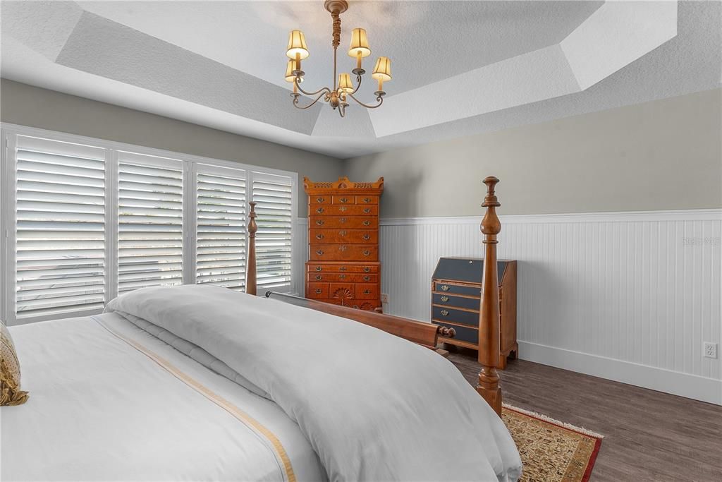 BEADBOARD WAINSCOTING AND 8" BASEBOARDS.