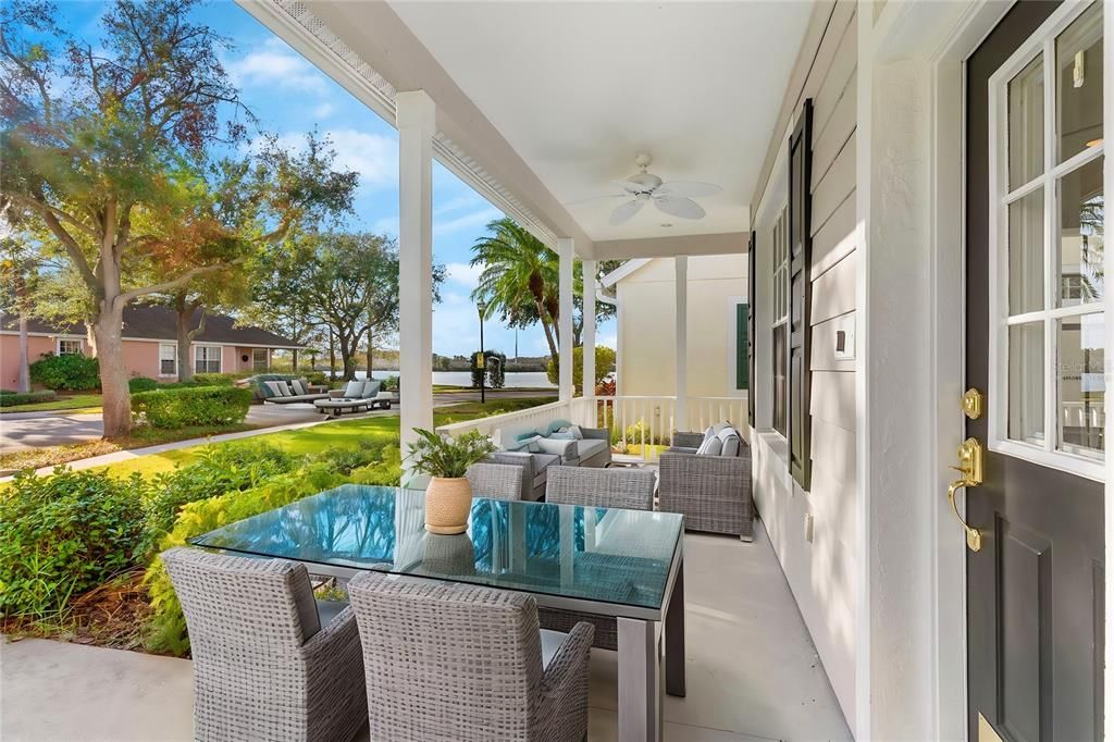 Beautiful front porch and waterfront view virtually staged