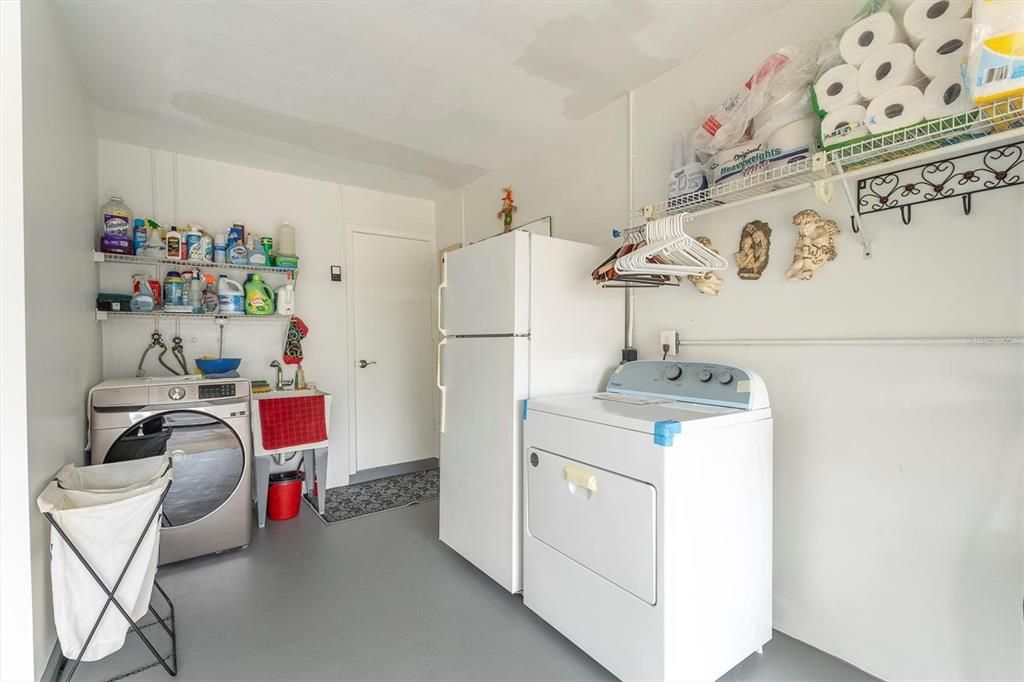 Washer dryer and garage fridge included with the sale of this home.