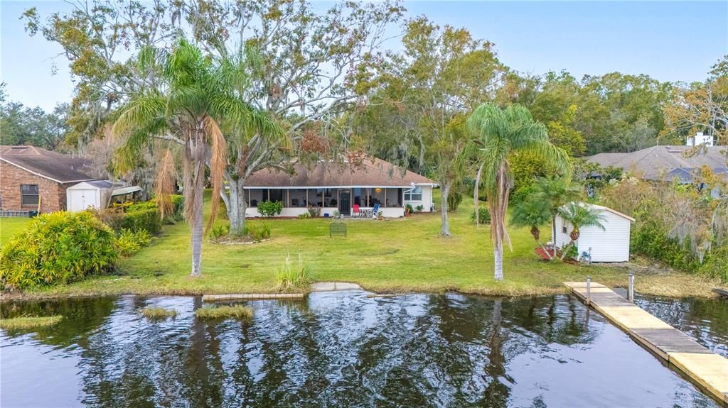 View from lake up to house