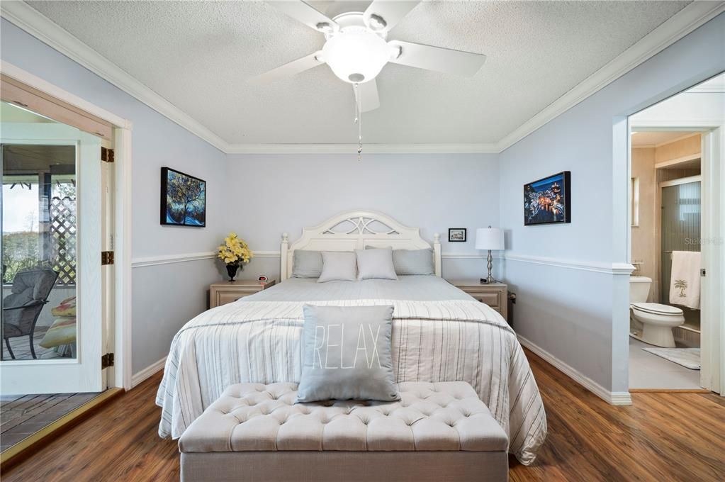 Primary Bedrom has French Doors leading out to screened lanai