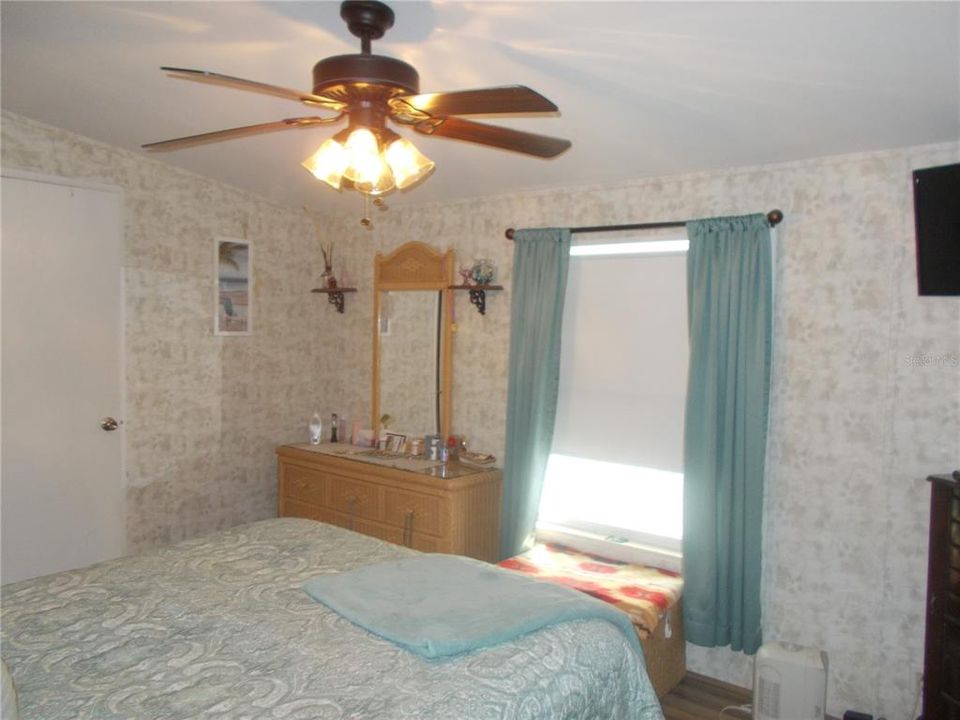 Master bedroom with ceiling fan