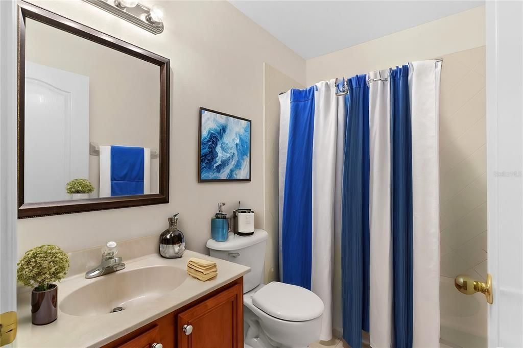 2nd floor middle full bathroom virtual staged