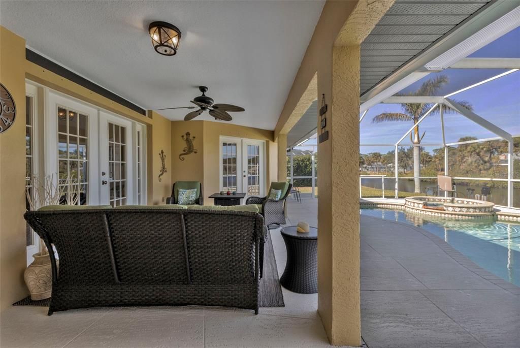 Large lanai/pool/spa area. Plenty of space under roof for entertaining!