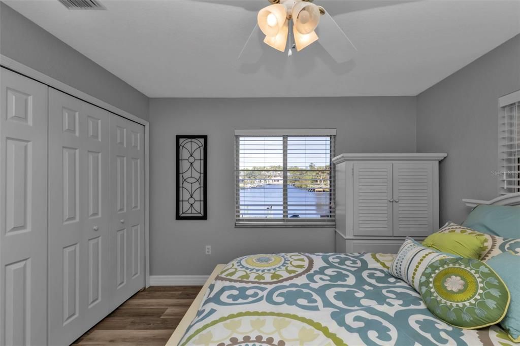 Bedroom two with amazing wide basin waterview! Large double door closet space too!