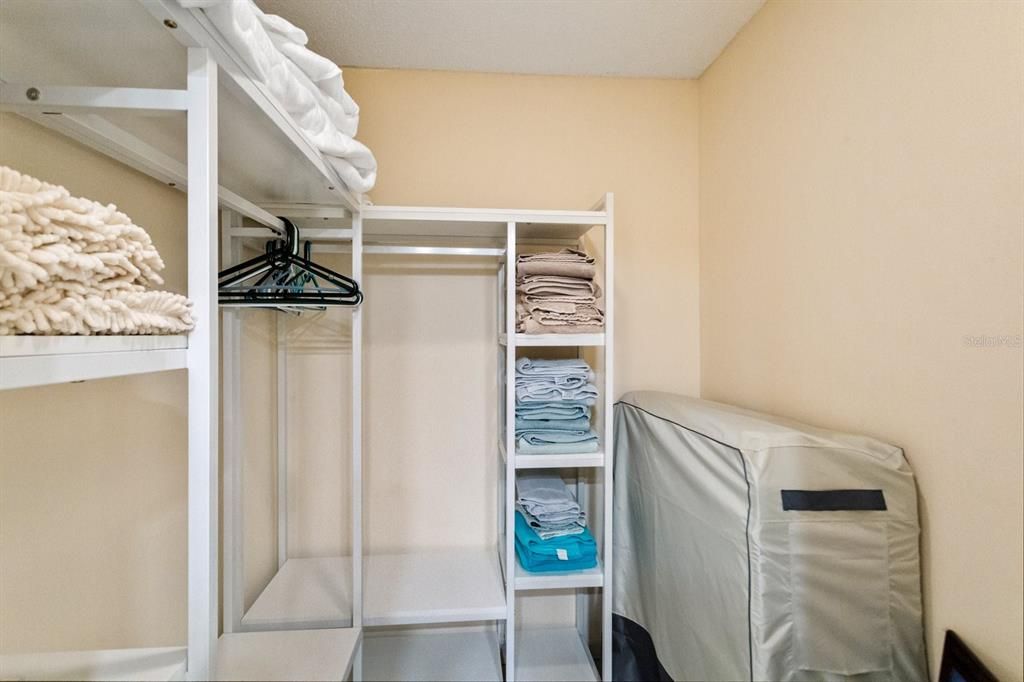 Walk-in closet off the main bathroom.