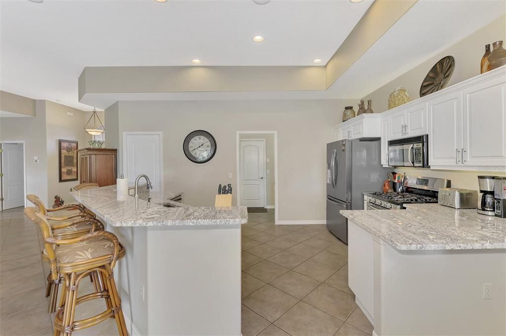 Walk in Pantry is the door to the left of the wall clock! Check out the separate photo