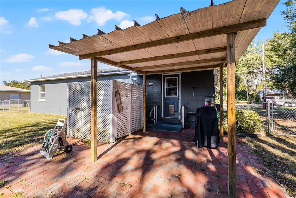 Brick patio with cover for grilling