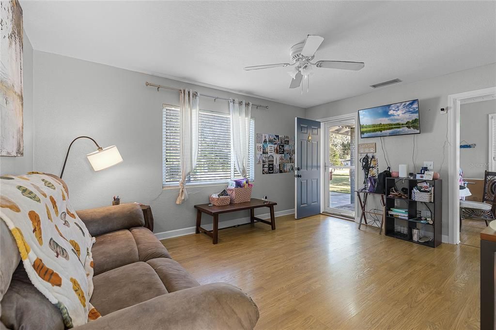 Ample living room with laminate flooring