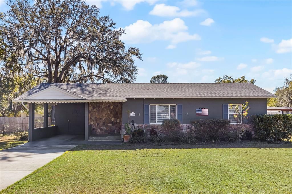 Sweet bungalow with stone beckons you to come take a look