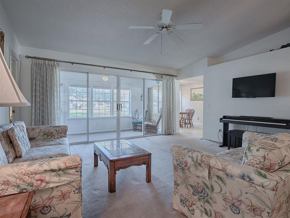 THE LIVING AREA GETS PLENTY OF NATURAL LIGHT FROM THE LANAI