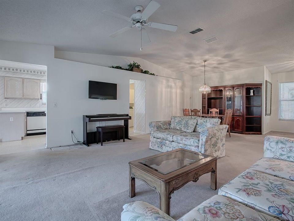 LOOK OUT FROM THE LIVING ROOM TO A LOVELY GOLF FRONT VIEW!