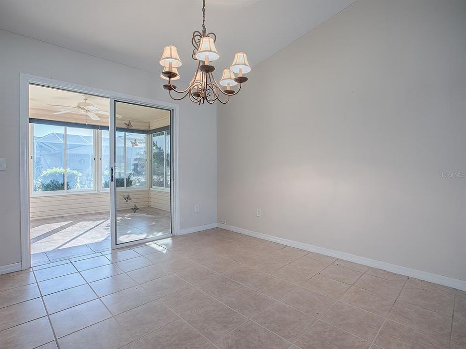 LET THE SUNSHINE IN! GLASS SLIDERS LEND A VIEW INTO THE LANAI