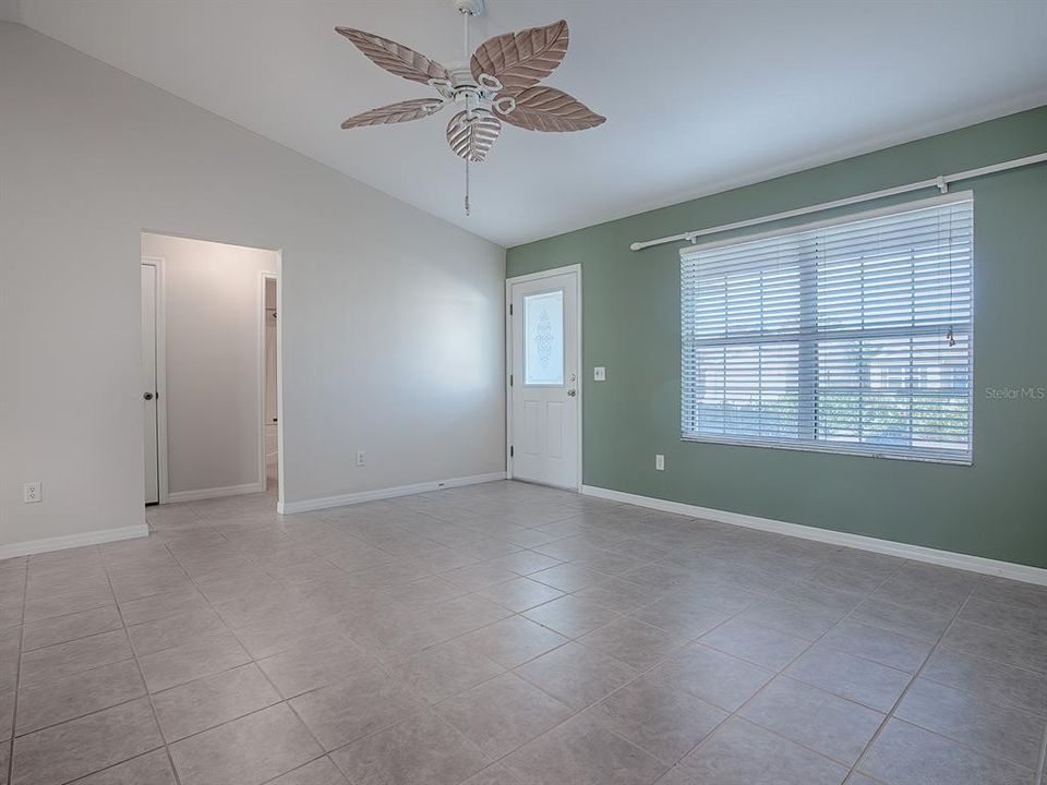 HIGH, VAULTED CEILING AND PLENTY OF NATURAL LIGHTING