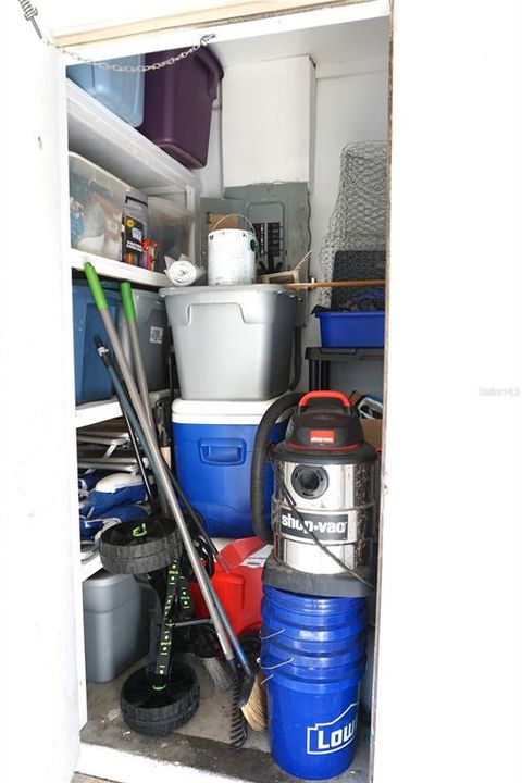 Storage closet inside with shelving