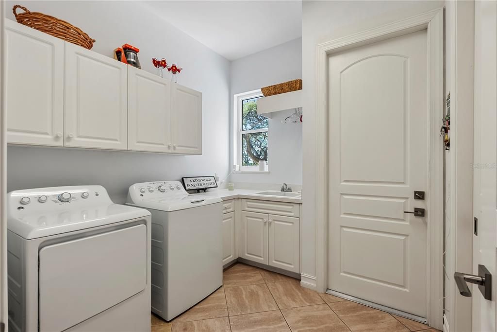 Laundry Room with Laundry Tub and Hanging Rack