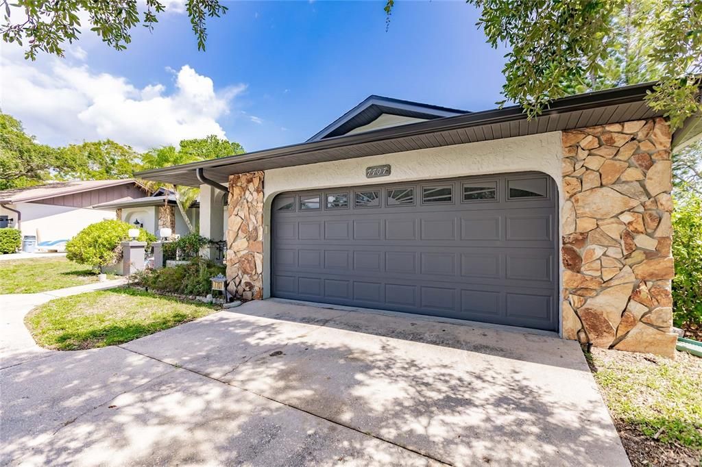 Rock around 2 Car Garage Door