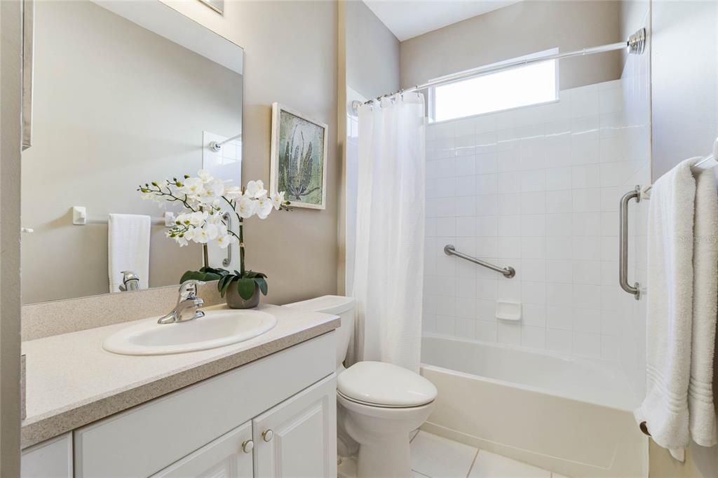 10' x 5' Guest Bathroom w/a tub/shower combo & grab bars